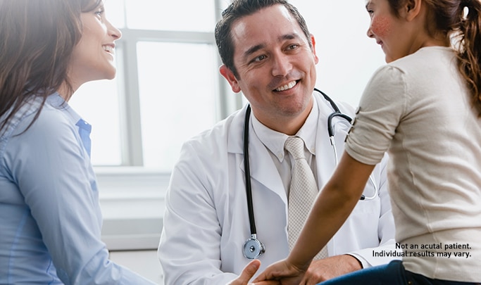 Doctor speaking with family
