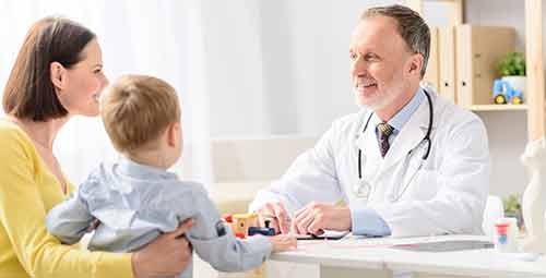Mother and Son talking with doctor